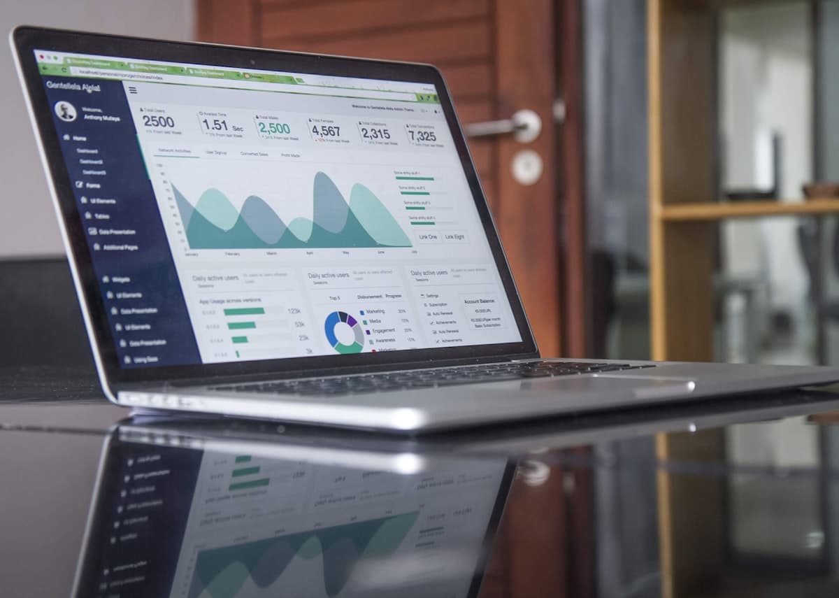Business owner reviewing working capital and term loan documents with finance advisor